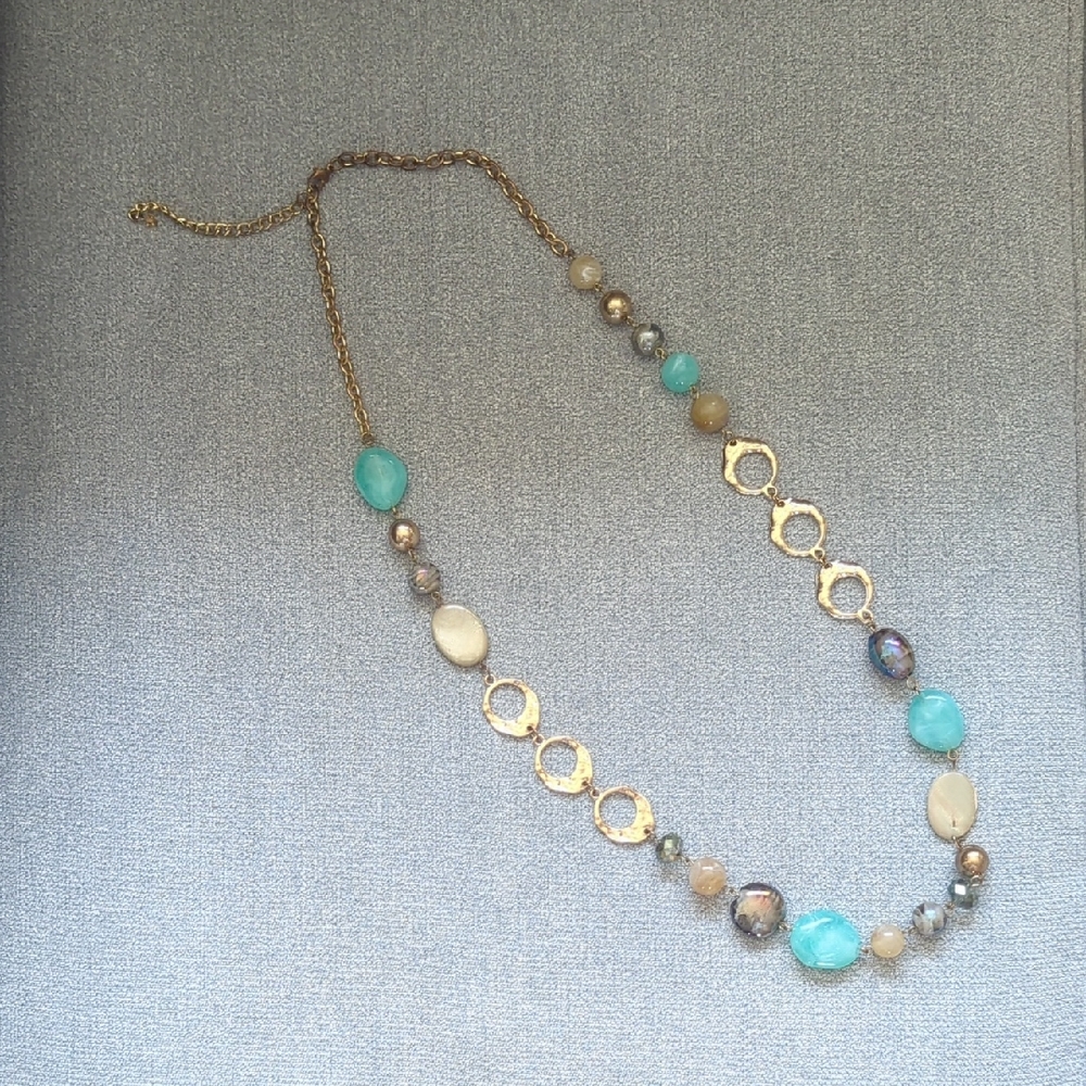 Elegant Gold Toned And Turquoise Colored Statement Necklace
